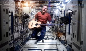 Canadian Space Agency astronaut Chris Hadfield performing aboard the International Space Station a revised version of David Bowie’s song Space Oddity, 12 May 2013. As reported by CSA, Hadfield, for his last downlink before returning to Earth, CSA Astronaut Chris Hadfield performed I.S.S. (Is Somebody Singing) with hundreds of students at the Ontario Science Centre and nearly a million people, mostly students from coast-to-coast Canada and around the world, performing the song in unison from their location. US astronaut Thomas Marshburn and Canadian astronaut Chris Hadfield are due to return back to Earth later on 13 May 2013. EPA/NASA / CSA / CHRIS HADFIELD / HANDOUT HANDOUT EDITORIAL USE ONLY plog
