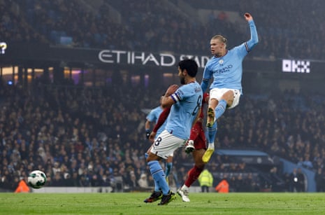 Erling Haaland scores the opener for City.