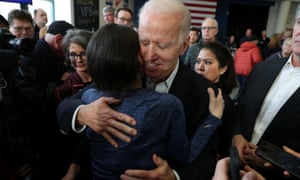 Joe Biden hugs a supporter after a campaign event in Dubuque, Iowa.