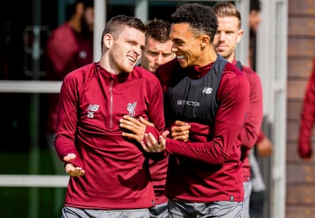 Andy Robertson shares a laugh with his ‘wingman’ Trent Alexander-Arnold before a Liverpool training session in May 2019