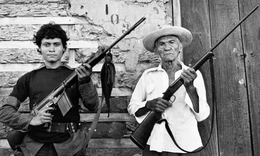 An 87-year-old veteran of the first Sandino rebellion stands with an 18-year-old Sandinista guerrilla in Nicaragua, June 19, 1979.