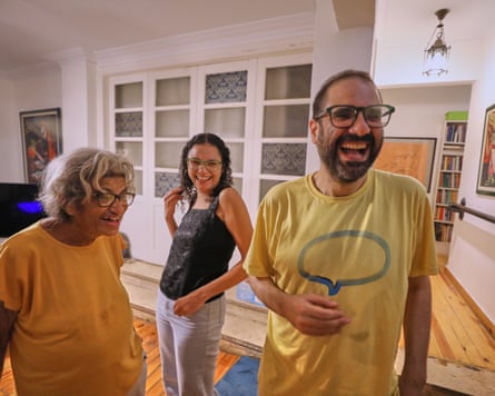 Alaa Abd el-Fattah, Laila Soueif and Sanaa Seif beaming with broad smiles in their living room