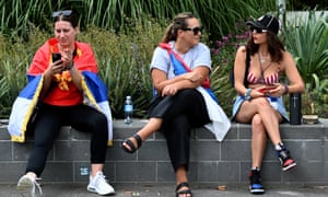 Supporters of tennis player Novak Djokovic outside the Park Hotel in Melbourne.