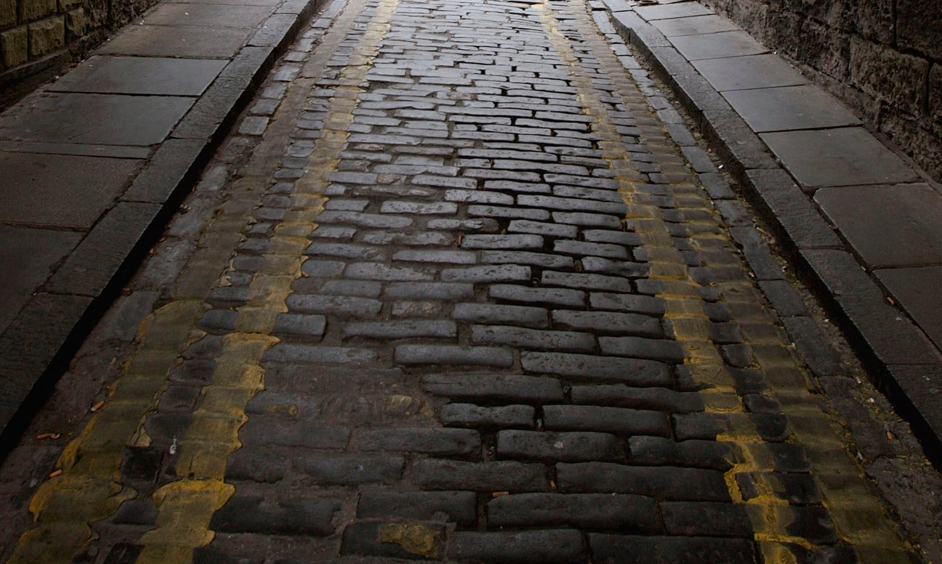 Adoquines cerca de la Royal Mile en Edimburgo. Fotografía: Jeff J Mitchell / Getty Images