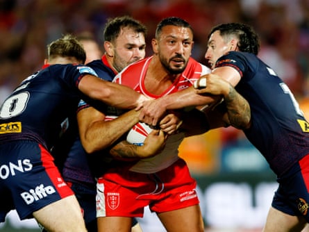 Hull KR’s Elliot Minchella is stopped by St Helens on a night of defensive domination in the Super League.