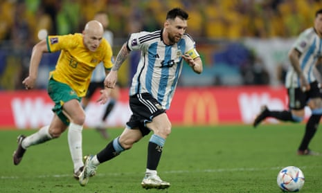 Lionel Messi skips away from Aaron Mooy during Argentina’s last-16 victory.