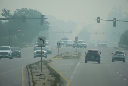 cars driving in smoky air