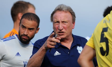 Neil Warnock makes a forceful point to his Cardiff City players during a pre-season friendly against Bodmin Town.