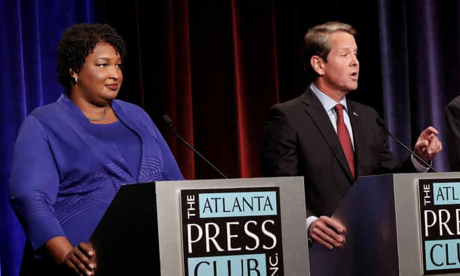Stacey Abrams and Brian Kemp at a debate in Atlanta, Georgia, in October.