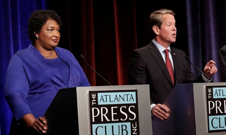 Stacey Abrams and Brian Kemp at a debate in Atlanta, Georgia, on 23 October 2018.