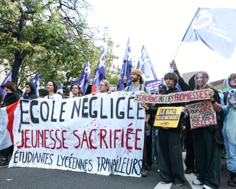 At the head of the march, protesters are holding a banner reading "Neglected school, sacrificed youth", during a nationwide youth demonstration in Paris, France.