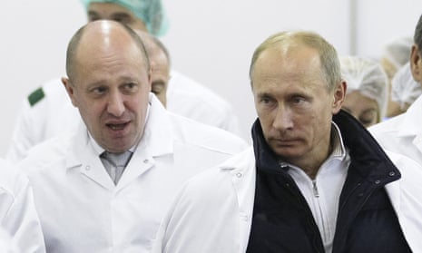 Yevgeny Prigozhin, left, with Vladimir Putin