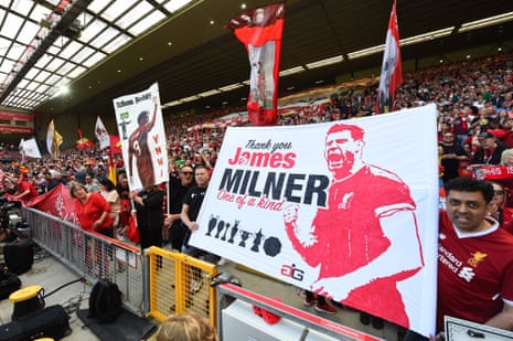 Tribute banners to Liverpool's Roberto Firmino and James Milner are pictured ahead of the English Premier League football match between Liverpool and Aston Villa at Anfield in Liverpool.