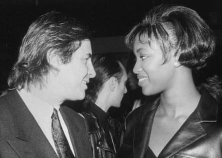 Elite modeling agency founder John Casablancas w. model Naomi Campbell at the Red Zone night club in 1990