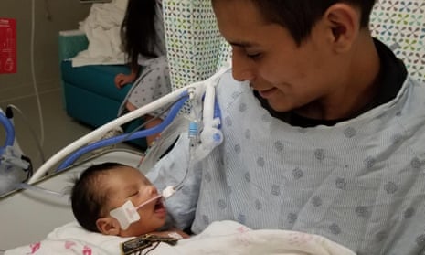 Baby cut from mother's womb in fetal abduction opens eyes in hospital |  Illinois | The Guardian