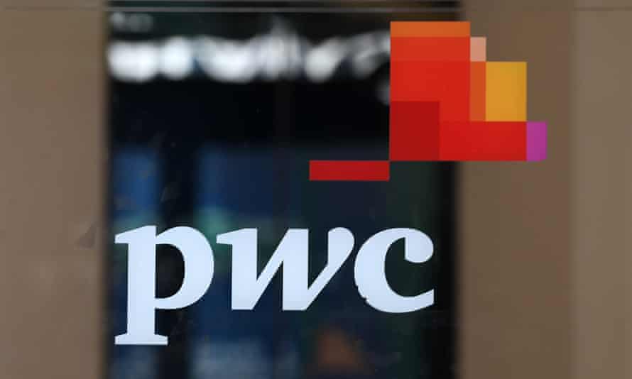 A Pricewaterhouse Coopers logo outside their premises in London.