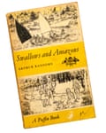 A paperback copy of Swallows and Amazons by Arthur Ransome