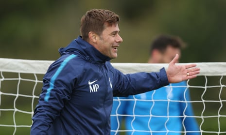 Tottenham’s manager Mauricio Pochettino keeps an eye on training the morning after the night before in London’s West End. 