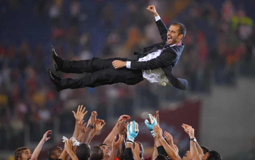 Pep Guardiola is tossed in the air by his Barcelona players after victory over Manchester United in the 2009 Champions League final.
