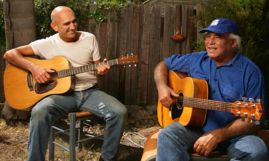 Singer-songwriters Paul Kelly and Kev Carmody in Kelly’s backyard
