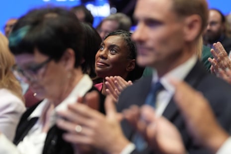 Kemi Badenoch listening to Andrew Griffith at the Tory conference.