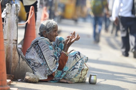 A woman asks for money near a busy road in Hyderabad. Rumours are swirling that the authorities have cleared beggars off the streets for Ivanka Trump’s biggest foreign mission since her father became president.