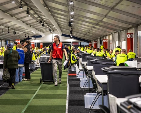 People count votes at the NDSM Warehouse the day after the Dutch House of Representatives elections in Amsterdam, the Netherlands.