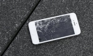 Apple iPhone with a cracked screen after a drop test from the DropBot