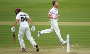 Sam Cook of Essex celebrates taking the wicket of Ben Green of Somerset.