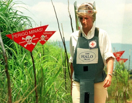 Diana, Princess of Wales walks through a safety corridor in a landmine field in Huambo, Angola, in 1997
