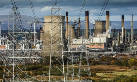 the cables, pylons and huge chimneys of the grangemouth refinery