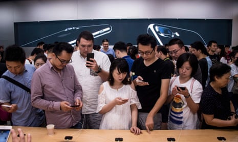 A year ago: customers testing the then-new iPhone 7 at an Apple store in Shanghai.