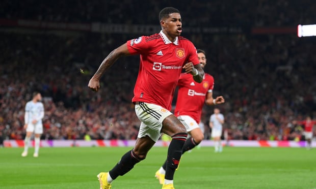 Manchester United’s Marcus Rashford runs away to celebrate his goal against Liverpool