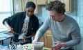 Ayo Edebiri, left, as Sydney, with Jeremy Allen White as Carmy, in season two of The Bear, intently preparing food in a kitchn