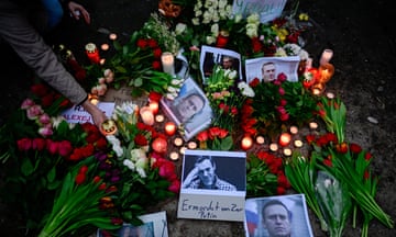 Flowers, candles and photos of Alexei Navalny