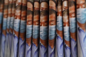 The day after police arrested media tycoon and pro-democracy activist Jimmy Lai for alleged ‘collusion with foreign forces’, residents bought up copies of his newspaper, Apple Daily, pictured. Many news stands and shops quickly sold out as supporters bought entire stacks of the paper, leaving copies for others to take for free.