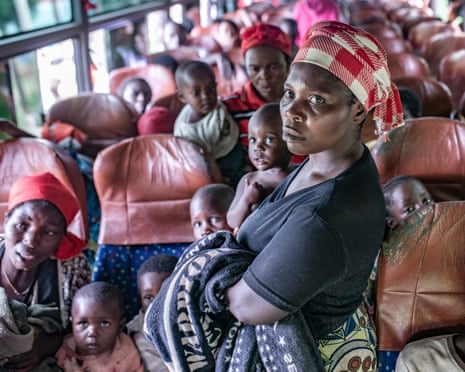 Women and children on a crowded bus