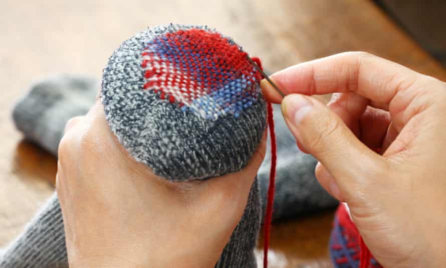 Holes can be creatively and colorfully repaired by darning and sewing.