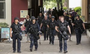 Los Angeles police officers searching the campus.
