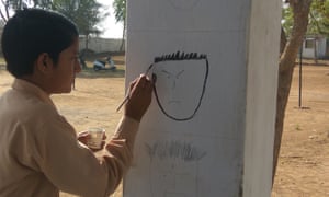 Child painting Indian school