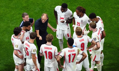 England manager Thomas Tuchel speaking with his players at the hydration break.