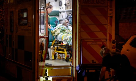 Clarice Freckleton being attended to by a London ambulance service worker.