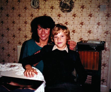 Robert Webb aged seven, at home with his mother