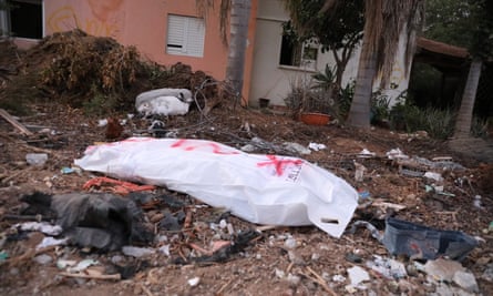 The body of a Hamas militant in kibbutz Be’eri