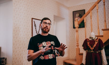 Podcast host Yevhen Murza with museum exhibits