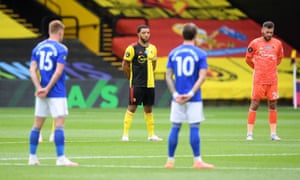 Watford’s Troy Deeney and Ben Foster during a minute’s silence.