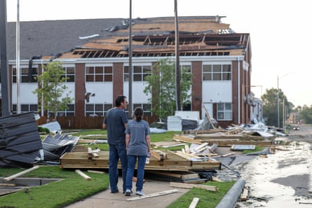 People view the damage at First Baptist Church, on Sunday, in Claremore, Oklahoma.
