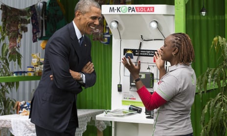 US president Barack Obama talks with an M-Kopa representative during the Power Africa Innovation Fair in Nairobi last year