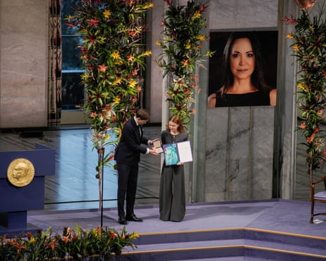 Ana Corina Sosa Machado, daughter of Nobel Peace Prize laureate Maria Corina Machado, accepts the award on behalf of her mother in Oslo last year.