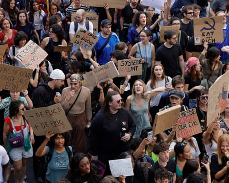 People take part in a demonstration part of a nationwide day of actions called by high-school students in Paris.
